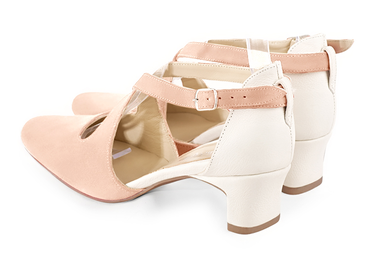 Powder pink and off white women's open side shoes, with crossed straps. Round toe. Low kitten heels. Rear view - Florence KOOIJMAN